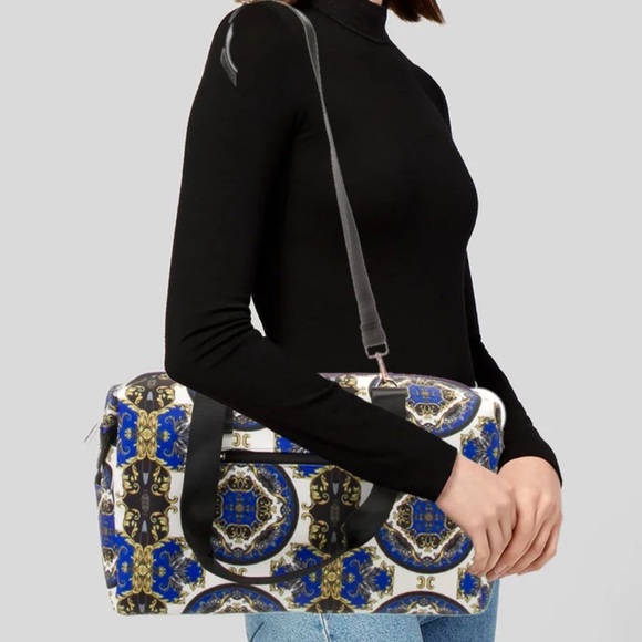 NWT- Alice + Olive weekender bag. Blue canvas printed with gold hardware. - Picture 2 of 5